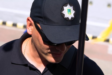 Odesa, Ukraine - July 03, 2016: Portrait of Plice officer preparing to meet the President of Ukraine Petro Poroshenko during celebration of NAVY day in Odesaのeditorial素材