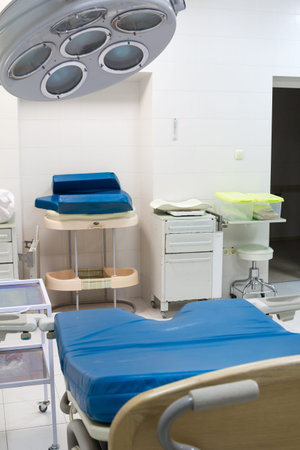 Medical bed in labour room at modern hospital. Delivery roomの写真素材