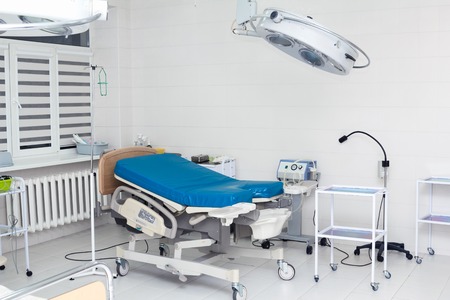 Medical bed in labour room at modern hospital. Delivery roomの写真素材