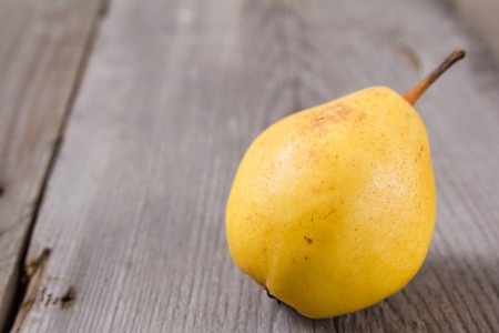 Juicy pears, fresh ripe organic pears on rustic wooden table, natural background, organic pears, diet food.の写真素材