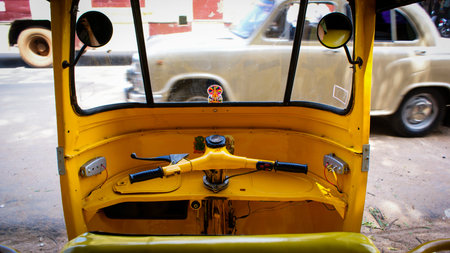 the view from behind the handlebars of an auto-rickshaw in Madurai, India.の写真素材