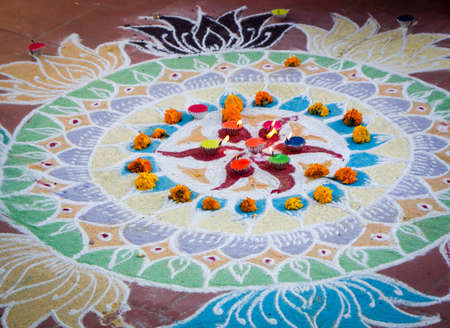 An elaborate kolam with candlesの写真素材