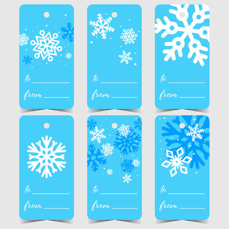 Christmas tags or labels for presents with white and blue snowflakes. Vector design of Christmas stickers, tickets and marks with a hole to tie or hang it on the gift boxes.のイラスト素材