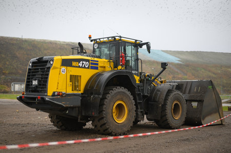 Riga, Latvia, November 15, 2022: Bulldozer equipment at waste processing siteのeditorial素材