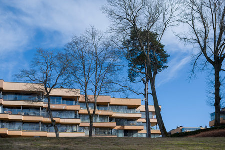 Saulkrasti, Latvia, March 16, 2023: New housing exterior as living and office buildings in a small cityのeditorial素材