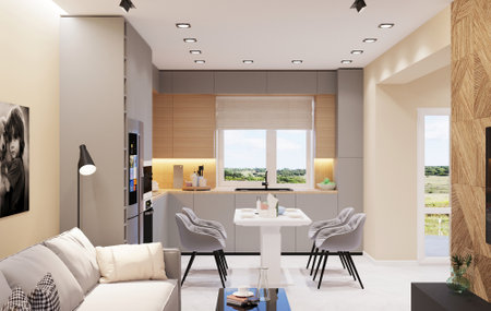 Interior of modern kitchen with white walls, concrete floor, beige and wooden cupboards and dining area.の写真素材