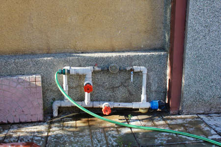 Water pipes Home construction with hot and cold blue and red pex pipe layout in pipes new bathtub house PVCの写真素材