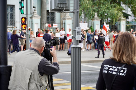 Moscow, Russia - August 2020: Peaceful rally at the Embassy of Belarus in Moscow in support of the Belarusian people, A person shoots a rally on cameraのeditorial素材