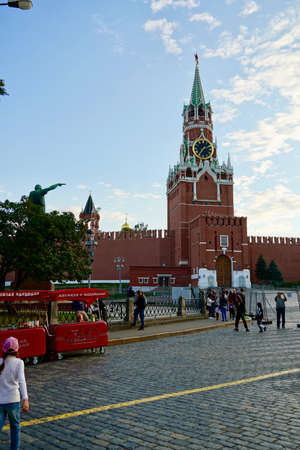 MOSCOW, Russia - August 2020: Tourists sit in a red tourist double-decker bus near Kremlin on Red Square for a tour of the capitals attractionsのeditorial素材