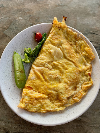 A plate of mexican omelet food and a cup of coffee Healthy lunch