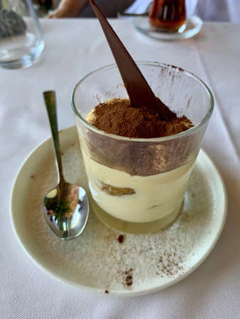 Very tasty chocolate dessert with whipped cream and roasted chocolate with dark chocolate mousseの写真素材