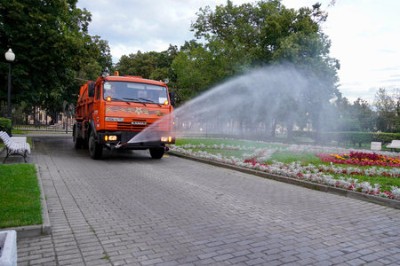 Moscow, Russia - August, 2020: Beautiful colored old houses on Kadashevskaya embankment and water fountains on the Vodootvodny canal in Moscow on a Sunny day, panoramic cityscapeのeditorial素材