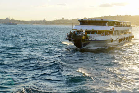 Istanbul, Bodrum - August 2020: Tour boats travel around the Bosphorus Canal on clear summer days. Bosphorus Sunset Cruise, Sultanahmet,のeditorial素材