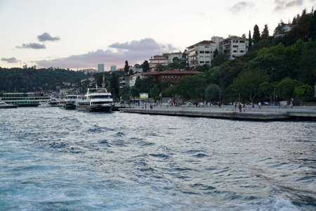 Istanbul skyline at sunset, Turkey. Beautiful cityscape of Istanbul with cruise ships. Traveling and vacation in Istanbul in summer at sunsetの写真素材