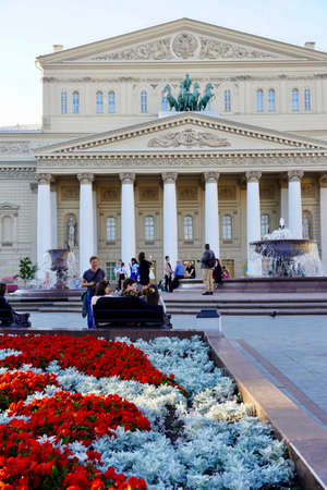Moscow, Russia - August 2020: Beautiful summer view of the Bolshoi Theatre with tourists in the center of Moscow, the main attractions of Russia, Summer landscape with blooming flowerbedsのeditorial素材