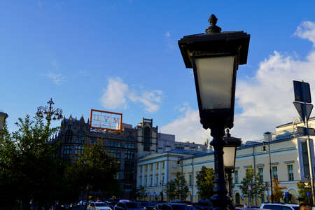 Moscow, Russia - August 2020: Forged lantern in the foreground against the background of the Bolshoi Theatre in the center of Moscow.のeditorial素材