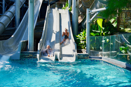 water slide at aquapark. Summer holiday.の写真素材