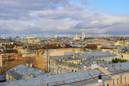 Concept for real estate panoramic modern cityscape building bird eye aerial view under sunrise and morning blue bright sky in St.Petersburg, Russia Urban landscape contrast the plants pipe and the domes of the church against a beautiful sky. Rooftop view. Historical and modern cent of the North capital of Russia High quality photoの写真素材