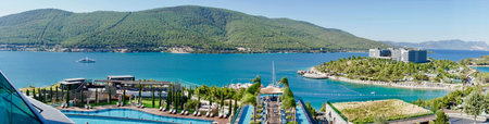 Stunning Turkey landmark of Island Bodrum. Tropic resort in lagoon with green exotic plants and trees. Greenery tropical nature at summer sunny day aerial view. Lux resort vacation conception. Vacation bannerの写真素材