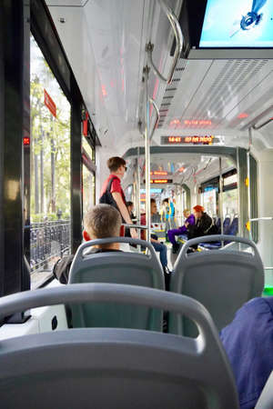 Moscow, Russia - September, 2020 People inside tramway wagon. Pandemic time, selective focusのeditorial素材