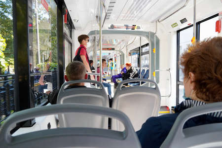 Moscow, Russia - September, 2020 People inside tramway wagon. Pandemic time, selective focusのeditorial素材
