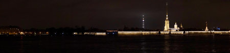 Saint Petersburg. Russia. Panoramic view. The Palace bridge is divorced. Raising of the bridges. Bridges Of Petersburg. View from the Neva to the Hermitage. Winter palace in the evening. Panorama of the city. Blue illuminated of the bridge. One of the main landscapes of Saint-Petersburgの写真素材