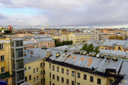 Panorama view, Concept for real estate panoramic modern cityscape building bird eye aerial view under sunrise and morning blue bright sky in St.Petersburg, Russia Urban landscape contrast the plants pipe and the domes of the church against a beautiful sky. Rooftop view. Historical and modern center of the North capital of Russiaの写真素材