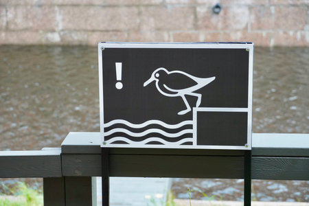 Warning sign - Cautiously dangerous descentの写真素材