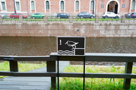 Warning sign - Cautiously dangerous descentの写真素材