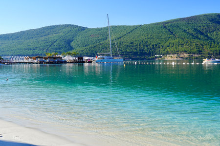 Bodrum, Turkey - August 2020: Hotel beach Lujo. Vacation in Paradise. Beautiful tropical beach banner. White sand travel tourism wide panorama background concept. Amazing beach landscape, yachts, Luxury tourismのeditorial素材