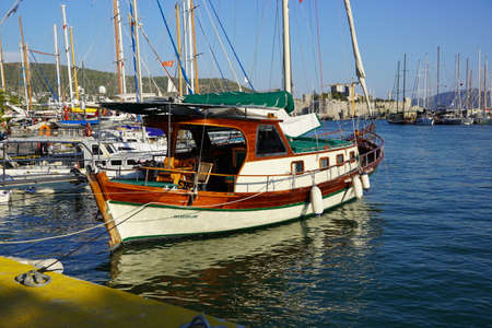 Bodrum, Turkey - August, 2020 Traditional colorful wooden fishing boats in harbor of Marina Bayのeditorial素材
