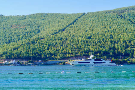 Bodrum, Turkey - August, 2020 Panoramic view of Beach And Blue Lagoon, beach and turquoise ocean with white yachts is the best beaches in Turkey - Bodrum, Turkeyのeditorial素材
