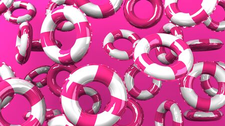 Pink swim rings on pink backgroundの写真素材