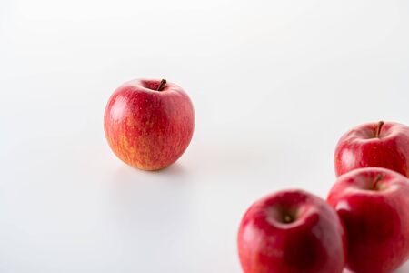 Red apples on white backgroundの写真素材