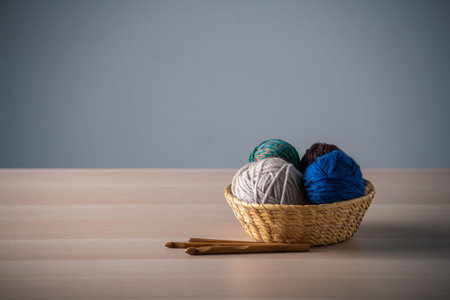 Yarn balls and crochet needes.