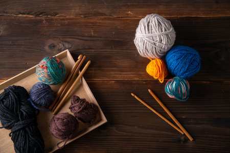 Yarn balls and crochet needes.