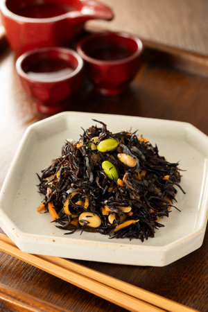 Simmered Hijiki seaweed.
We cook Hijiki seaweed, carrots and soybeans in soy sauce, a common side dish in Japan.の写真素材