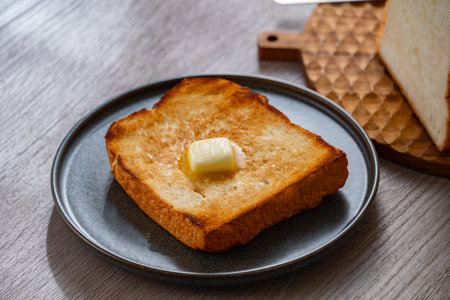 Buttered toast. Delicious white bread image.の写真素材