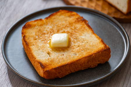 Buttered toast. Delicious white bread image.の写真素材