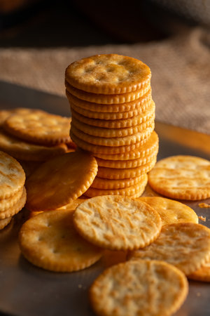 Round Crackers Snack A close-up photo of round crackers. Perfect for food, snack, bakery, or cooking-related projects.の写真素材