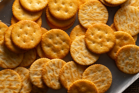 Round Crackers Snack A close-up photo of round crackers. Perfect for food, snack, bakery, or cooking-related projects.の写真素材