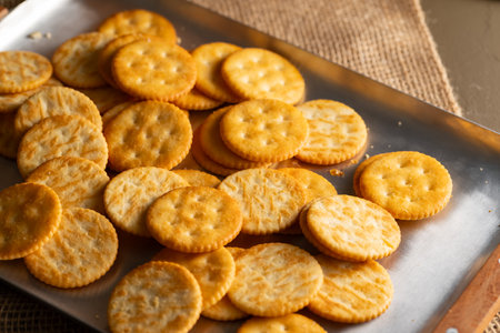 Round Crackers Snack A close-up photo of round crackers. Perfect for food, snack, bakery, or cooking-related projects.の写真素材