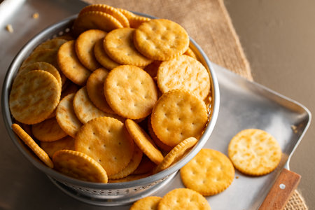 Round Crackers Snack A close-up photo of round crackers. Perfect for food, snack, bakery, or cooking-related projects.の写真素材
