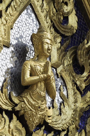 Statue of the deity in the temple Buddhaの写真素材