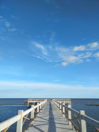 The walkway is made of cement. For tourists on the sea.の写真素材