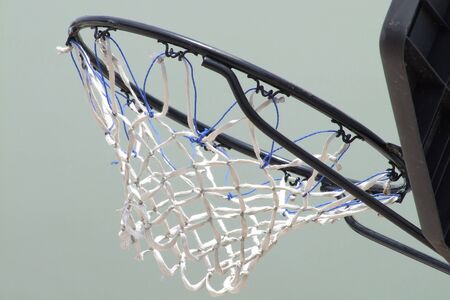 Basketball hoop with white netの写真素材