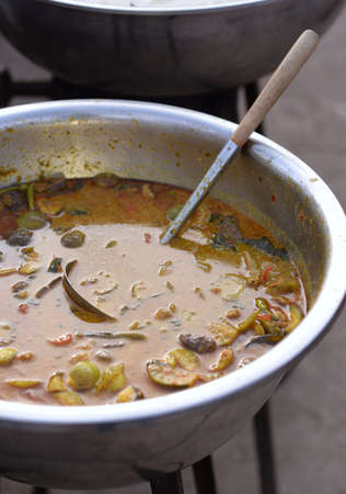 Chicken Curry In a large bowl and with dippers inside for sale.の写真素材