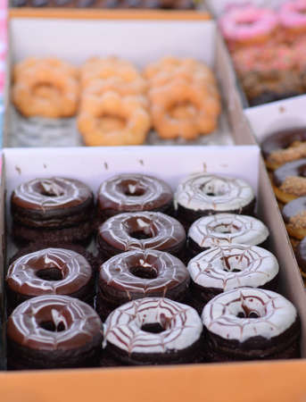 Set of colorful and delicious donut in paper boxの写真素材