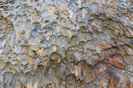 Abstract backdrop. Brown gray granite wall stone background or texture pattern solid nature rockの写真素材