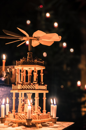 German Christmas and advent candle Pyramid spinning round and moving in circlesの写真素材